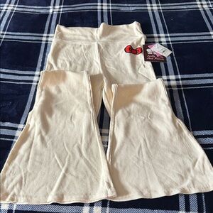 Hello Kitty Cream Flared Leggings with Red Bow Detail size  xs nwt